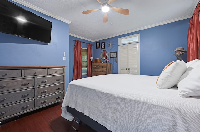 7551 Basswood Forest Ct, Houston, TX 77095 - bedroom with dark wood-type flooring, ornamental molding, ceiling fan, and a closet