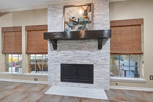 7551 Basswood Forest Ct, Houston, TX 77095 - detailed view of ornamental molding, a fireplace, and baseboards