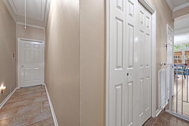 7551 Basswood Forest Ct, Houston, TX 77095 - hallway featuring attic access, crown molding, baseboards, and stone finish floors