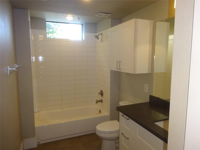 2401 Crawford Unit 105, Houston, TX 77004 - full bath with toilet, shower / washtub combination, vanity, and tile patterned floors