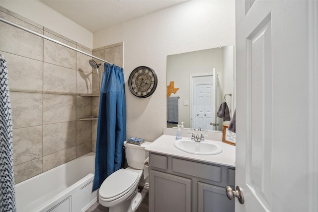 257 N Lynx Trl, Montgomery, TX 77316 - full bathroom with toilet, vanity, shower / bath combination with curtain, and a textured wall