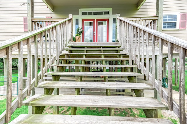 entrance to property with a deck