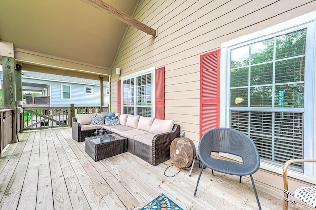 deck with an outdoor hangout area