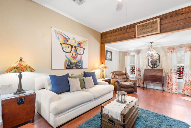311 Depot St, Dayton, TX 77535 - living area featuring crown molding, a ceiling fan, visible vents, and wood finished floors