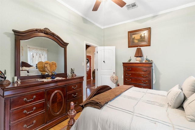 311 Depot St, Dayton, TX 77535 - bedroom with ceiling fan, ornamental molding, visible vents, and wood finished floors