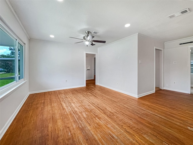 unfurnished room featuring light wood-type flooring, visible vents, recessed lighting, a ceiling fan, and baseboards
