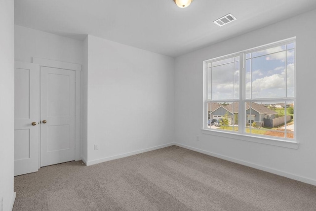 8114 Red Shiner Way, Fulshear, TX 77441 - carpeted spare room with baseboards