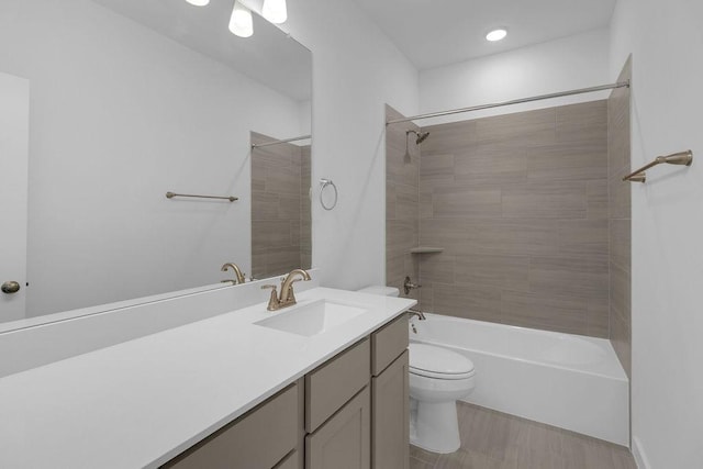 8114 Red Shiner Way, Fulshear, TX 77441 - bathroom featuring vanity, washtub / shower combination, wood finished floors, and recessed lighting