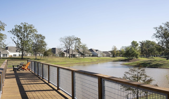8114 Red Shiner Way, Fulshear, TX 77441 - wooden terrace featuring a water view, a residential view, and a lawn