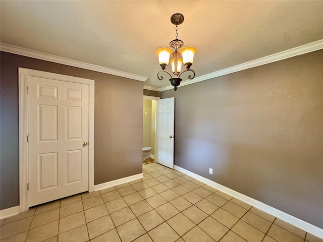 805 Dugas St, Bridge City, TX 77611 - empty room with a chandelier, crown molding, baseboards, and light tile patterned floors