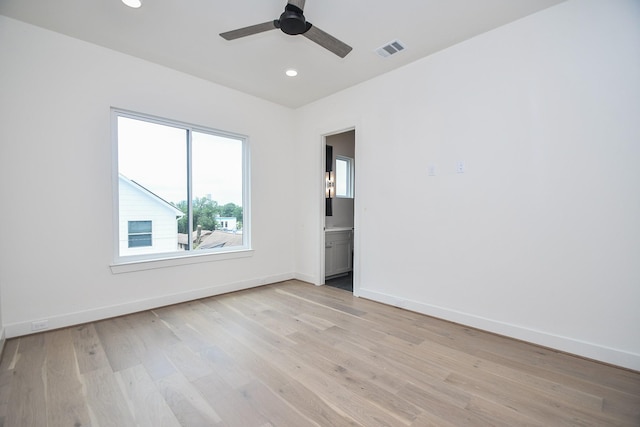 4709 Gibson St, Houston, TX 77007 - spare room featuring ceiling fan, light wood-type flooring, baseboards, and recessed lighting
