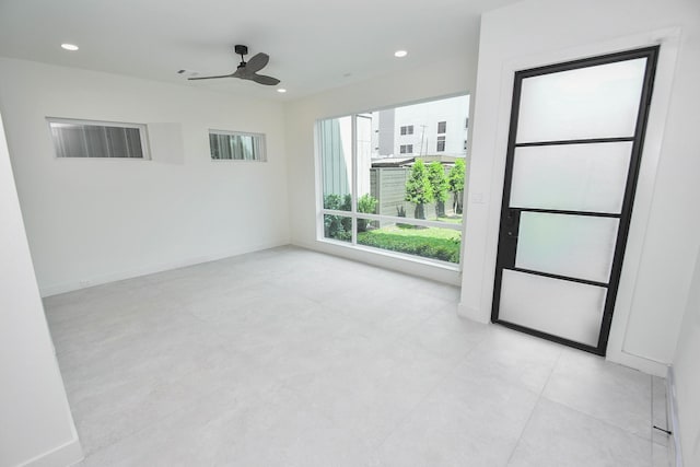 4709 Gibson St, Houston, TX 77007 - unfurnished room with a ceiling fan, recessed lighting, and baseboards