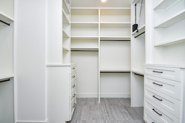 4709 Gibson St, Houston, TX 77007 - walk in closet featuring light wood-style floors