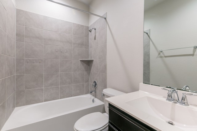 full bath with toilet, vanity, and shower / washtub combination