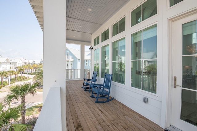 201 Lakeshore St, Port Aransas, TX 78373 - wooden terrace with a residential view