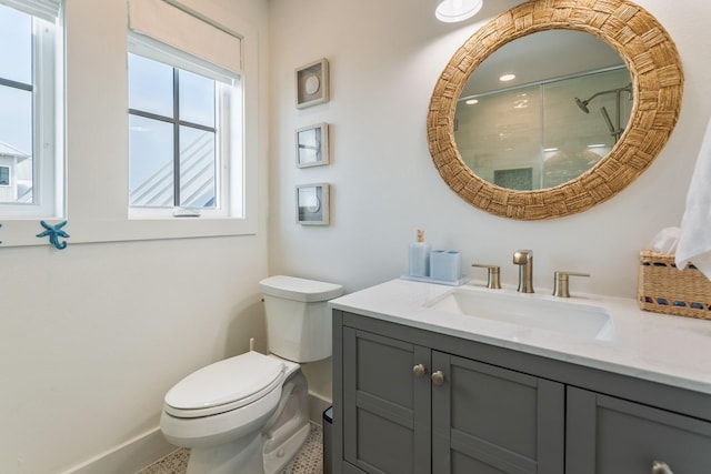 201 Lakeshore St, Port Aransas, TX 78373 - bathroom with vanity, toilet, and baseboards