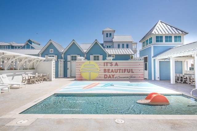 201 Lakeshore St, Port Aransas, TX 78373 - view of swimming pool with outdoor dining area