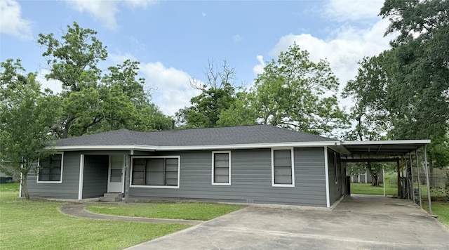 231 Moore St, Richwood, TX 77531 - ranch-style house featuring fence, driveway, an attached carport, a front lawn, and a shingled roof