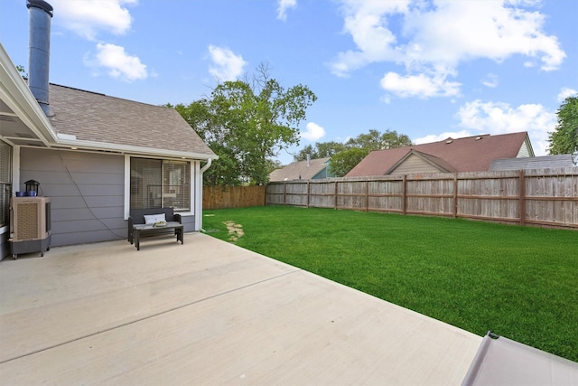 view of yard featuring a patio area and a fenced backyard