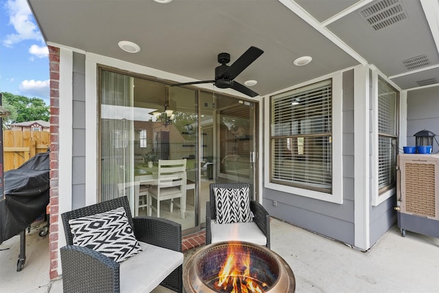 18730 Haughland Dr, Cypress, TX 77433 - view of patio / terrace with an outdoor fire pit, a ceiling fan, area for grilling, and fence