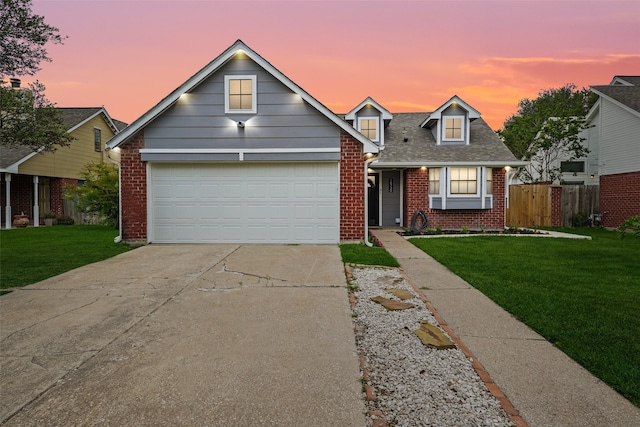 18730 Haughland Dr, Cypress, TX 77433 - view of front facade with brick siding, concrete driveway, an attached garage, and roof with shingles