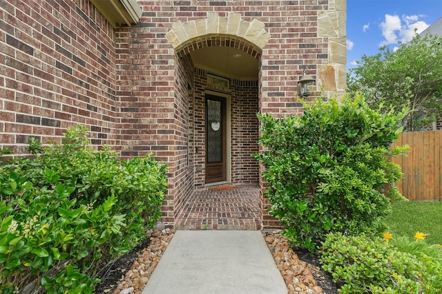 3743 Pinebrook Hollow Ln, Spring, TX 77386 - view of exterior entry with fence and brick siding