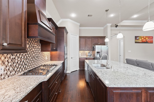 3743 Pinebrook Hollow Ln, Spring, TX 77386 - kitchen featuring a sink, stainless steel appliances, dark wood-type flooring, visible vents, and custom exhaust hood