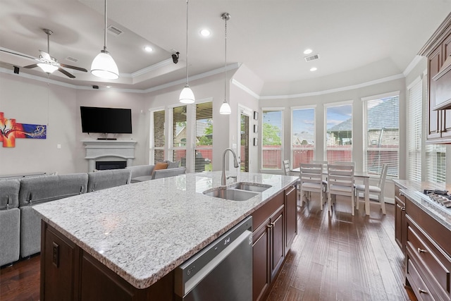 3743 Pinebrook Hollow Ln, Spring, TX 77386 - kitchen featuring a sink, ornamental molding, dishwashing machine, visible vents, and open floor plan
