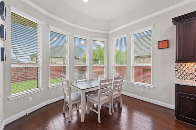3743 Pinebrook Hollow Ln, Spring, TX 77386 - dining room featuring dark wood-style flooring, ornamental molding, and baseboards