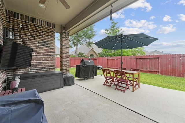 3743 Pinebrook Hollow Ln, Spring, TX 77386 - view of patio featuring outdoor dining area, a fenced backyard, ceiling fan, and grilling area