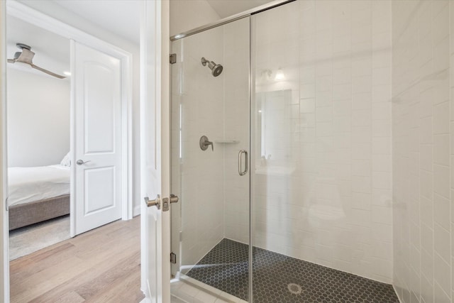 3606 Lannister Ln, Houston, TX 77055 - ensuite bathroom with a stall shower and wood finished floors