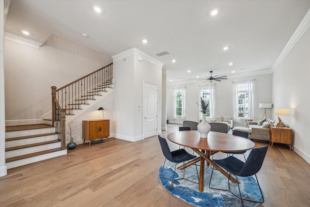 3606 Lannister Ln, Houston, TX 77055 - dining area featuring light wood finished floors, stairway, recessed lighting, ornamental molding, and ceiling fan