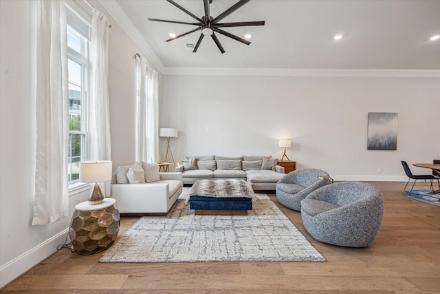 3606 Lannister Ln, Houston, TX 77055 - living room with ornamental molding, wood finished floors, and recessed lighting