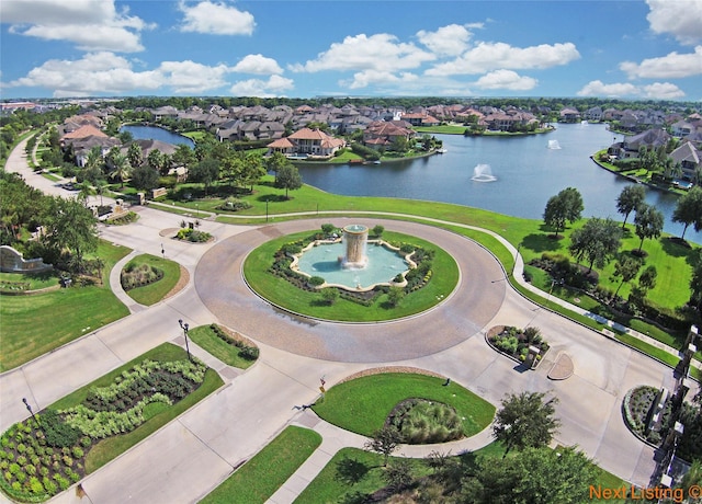 aerial view with a water view and a residential view