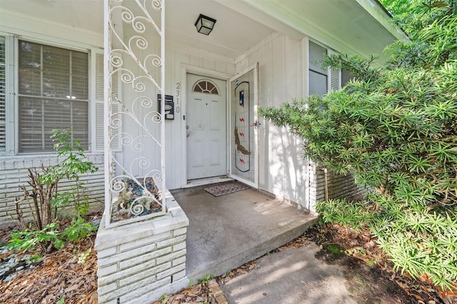 2310 Pecos St, La Marque, TX 77568 - doorway to property featuring board and batten siding