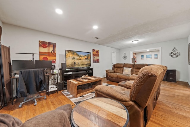 2310 Pecos St, La Marque, TX 77568 - living room with light wood finished floors, visible vents, and recessed lighting