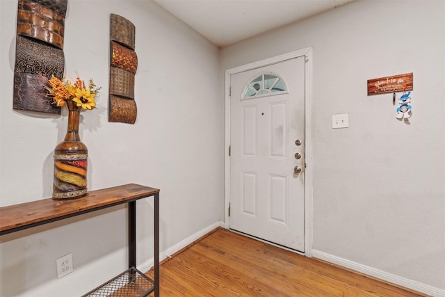 2310 Pecos St, La Marque, TX 77568 - entryway with baseboards and light wood finished floors