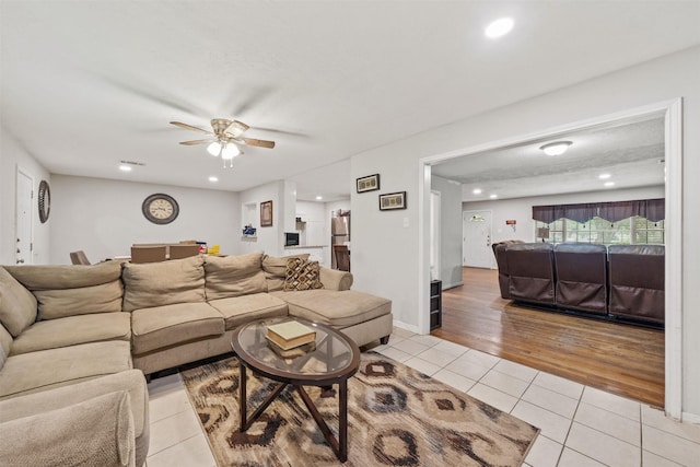 2310 Pecos St, La Marque, TX 77568 - living area with a ceiling fan, recessed lighting, and light tile patterned flooring