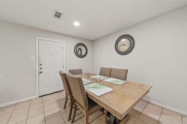 2310 Pecos St, La Marque, TX 77568 - dining area featuring visible vents, baseboards, and light tile patterned flooring