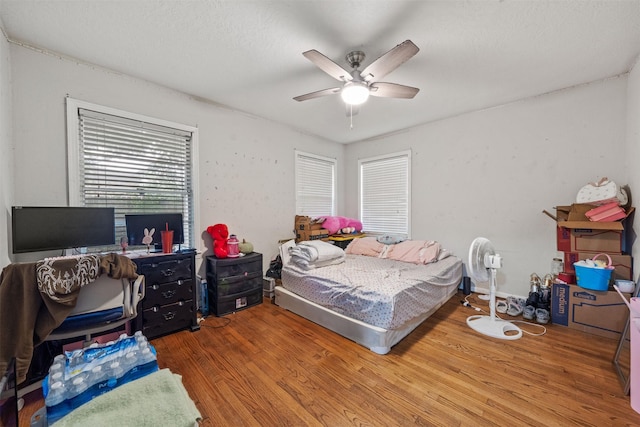 2310 Pecos St, La Marque, TX 77568 - bedroom featuring ceiling fan and wood finished floors