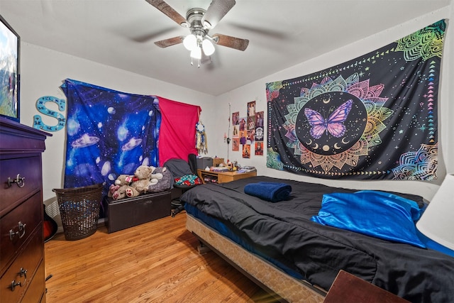 2310 Pecos St, La Marque, TX 77568 - bedroom featuring ceiling fan and wood finished floors