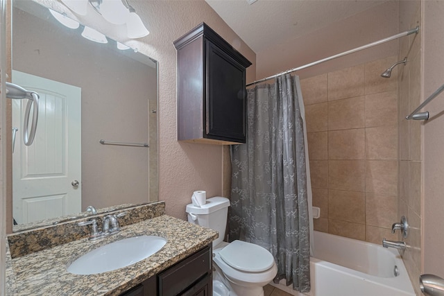 3603 Canvasback Ln, Houston, TX 77047 - bathroom featuring shower / tub combo, vanity, toilet, and a textured wall
