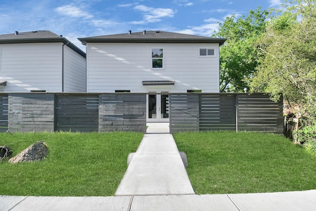 6553 Sealey St, Houston, TX 77091 - exterior space featuring french doors, a yard, and fence