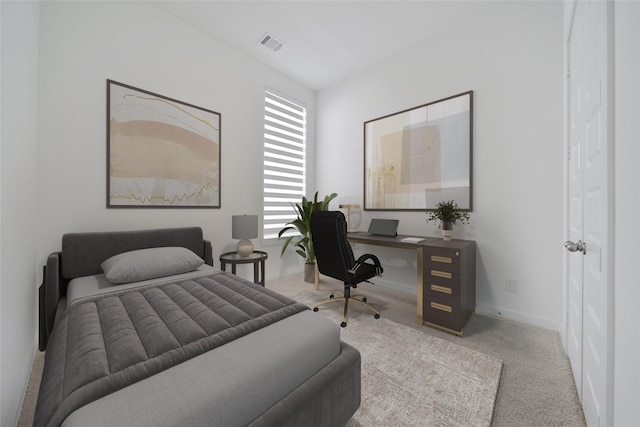 carpeted bedroom with visible vents and baseboards
