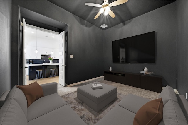 living room with a ceiling fan