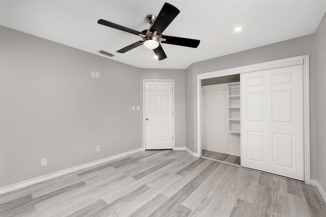 701 Briar Ct, Brownsville, TX 78521 - unfurnished bedroom with a closet, light wood-type flooring, visible vents, baseboards, and ceiling fan