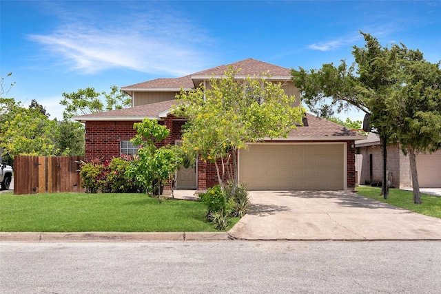 701 Briar Ct, Brownsville, TX 78521 - view of front of home with fence, an attached garage, a shingled roof, concrete driveway, and a front yard