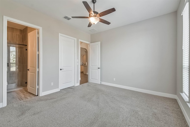 11131 Heartleaf Aster Way, Cypress, TX 77433 - unfurnished bedroom with carpet, visible vents, and baseboards