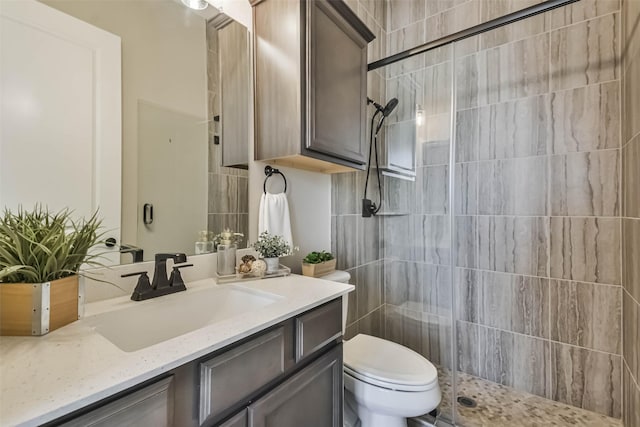 11131 Heartleaf Aster Way, Cypress, TX 77433 - full bathroom featuring toilet, vanity, and a shower stall