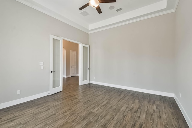 11131 Heartleaf Aster Way, Cypress, TX 77433 - unfurnished room featuring french doors, baseboards, visible vents, ceiling fan, and wood finished floors
